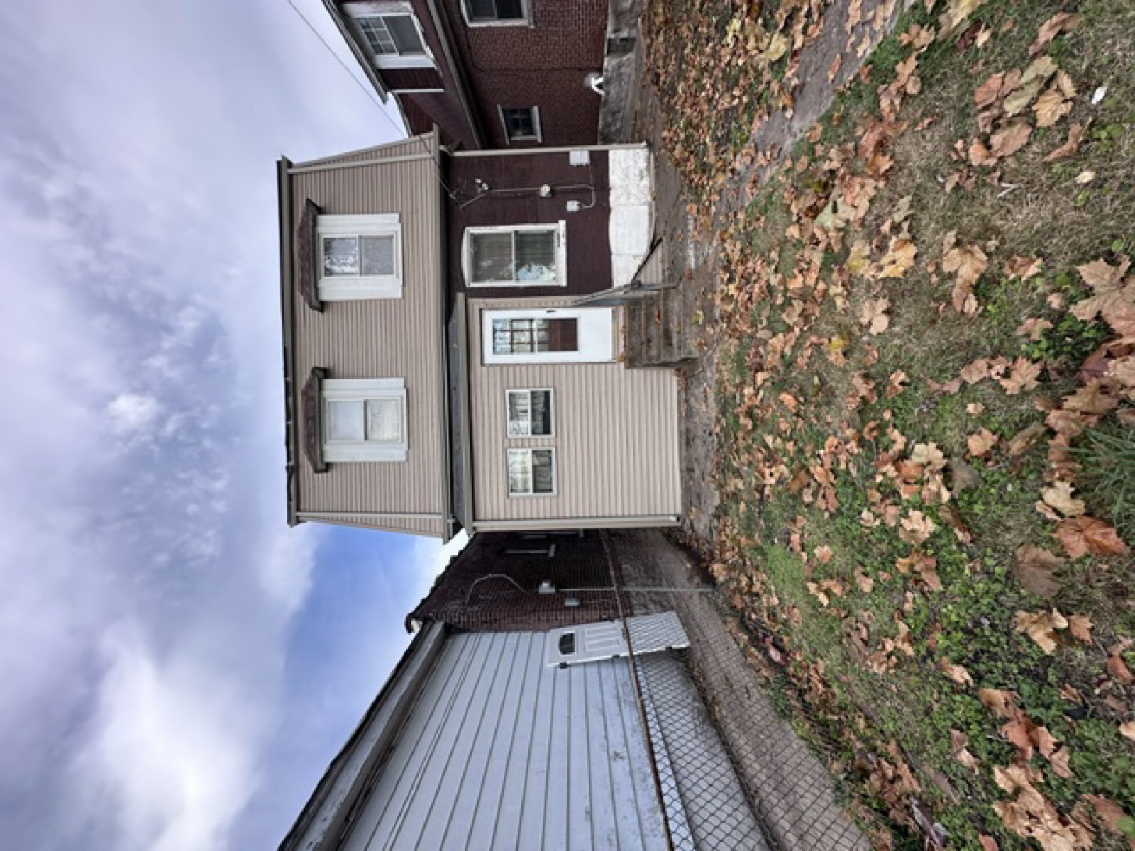 Exterior renovation complete — new siding