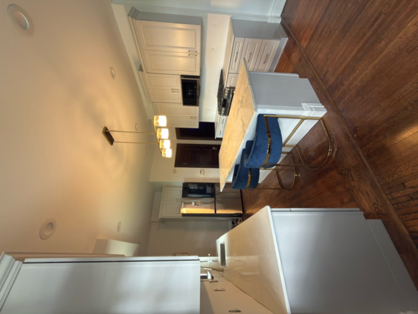 Kitchen remodel — island with gold pendant lighting